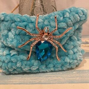 Rose Gold Tone Spider Brooch with Blue Crystal Accent